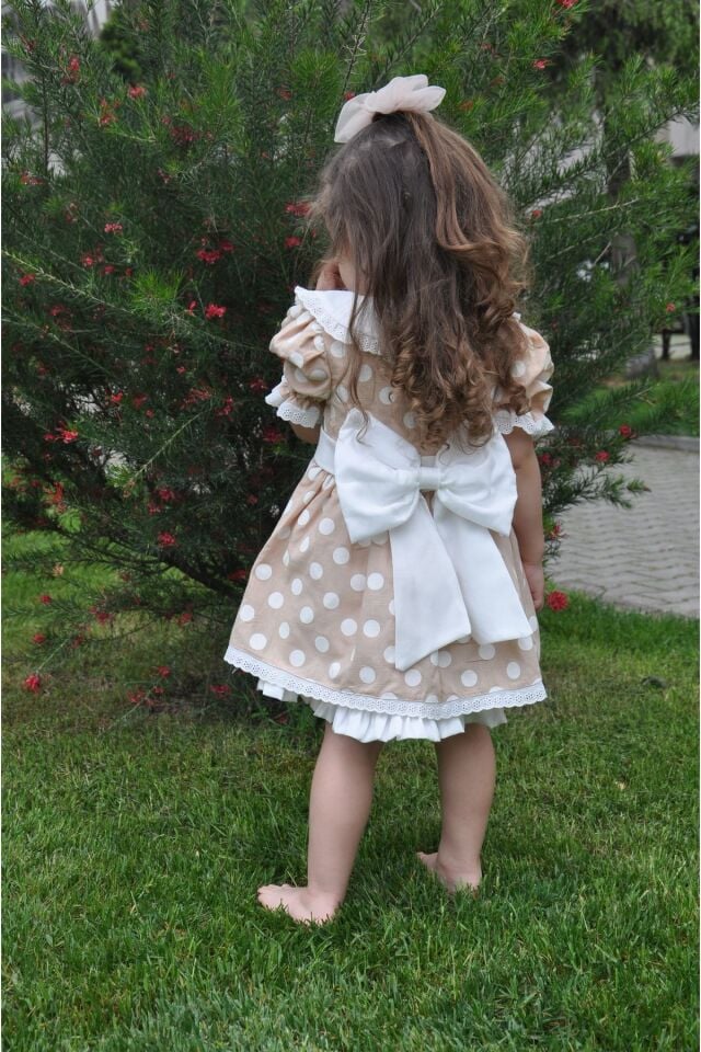 Puantiyeli Bebe Yakalı Arkası Fiyonklu Kız Çocuk Elbise